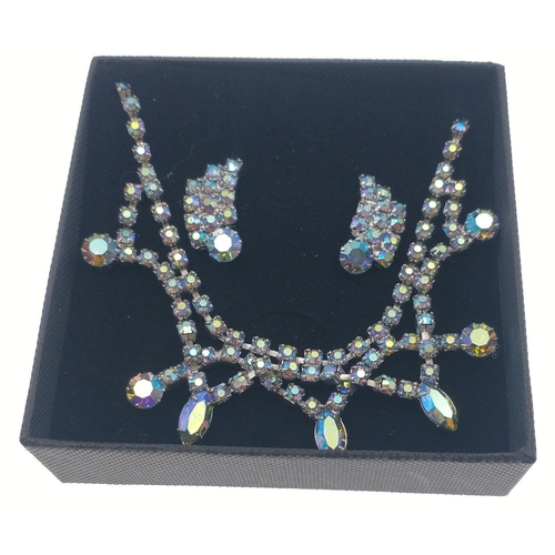 83 - A spectacular gift for a special lady this Christmas - a boxed set of a sparkly necklace extending t... 