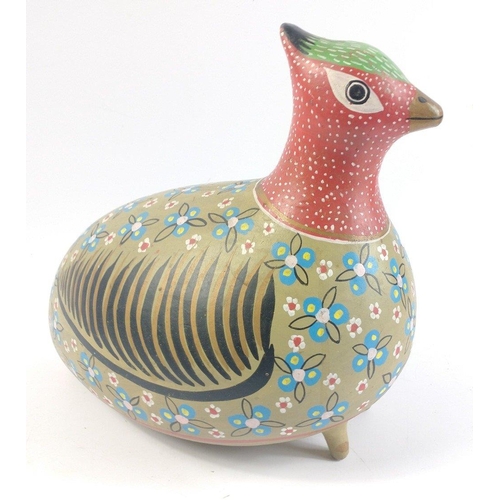 262 - An unusual ceramic bird in the form of a PARTRIDGE or a GUINEA FOWL very brightly painted and stands... 