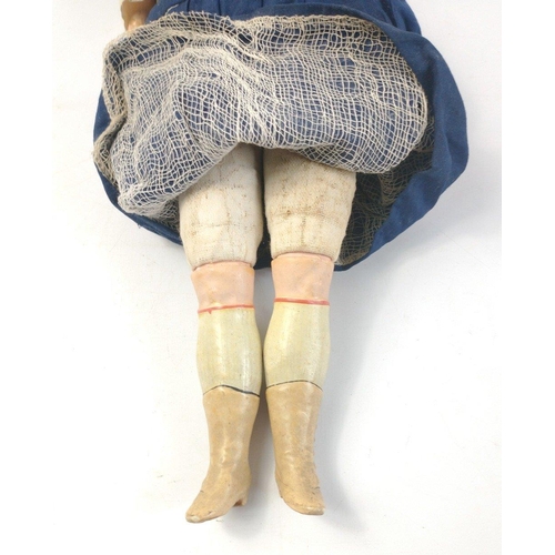 344 - A small vintage composite doll 38cm high approx with soft body and hard limbs and face.  Particularl... 