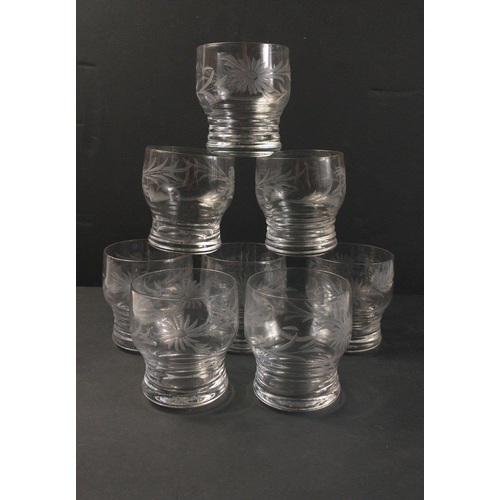 406 - A set of eight glass tumblers with incised pattern and a large water jug floral design and 7 port gl... 