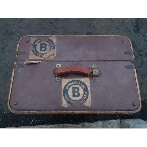 493 - A substantial travel trunk measuring approx 84 x 52 x 34 cm.  Wooden banding in good condition with ... 