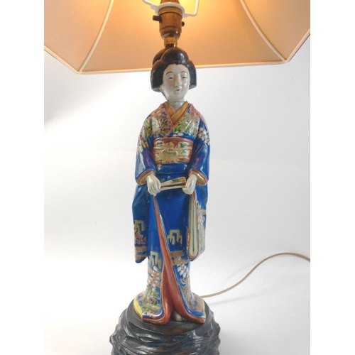 602 - A rather attractive Geisha style Oriental lady ornament presented as a lamp.  A very pretty ceramic ... 