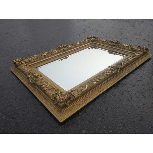 615 - A SUBSTANTIAL mid-19th century wall stucco and gilt framed wall mirror 114cm x 84cm#222