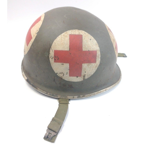 139 - WWII United States US M1 helmet with Red Cross decals.  Intact chin strap and liner.#138