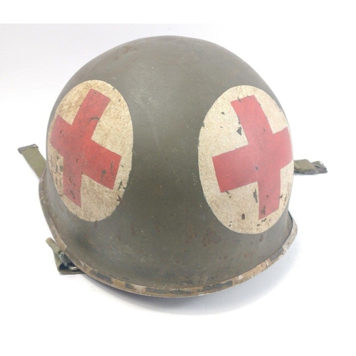 139 - WWII United States US M1 helmet with Red Cross decals.  Intact chin strap and liner.#138