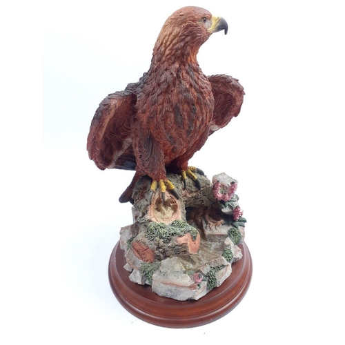 202 - A Country Artists model of an eagle, by David Ivey, 1998. Stands 25cm high approx on wooden plinth. ... 