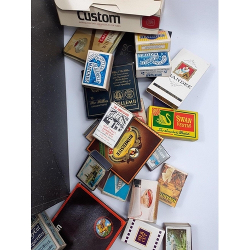 233 - A super collection of older tobacciana items to include matchboxes, cigarette packs and tins.  A ver... 