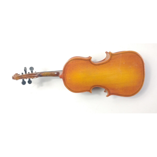 238 - A miniature VIOLIN within its original case - dimensions 24cm x 8.5cm approx - one of the case hinge... 