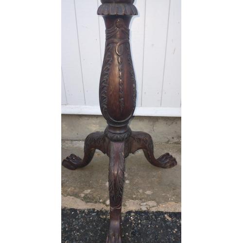 328 - A three-legged carved wooden base for a torchere standing 105cm tall approx#331