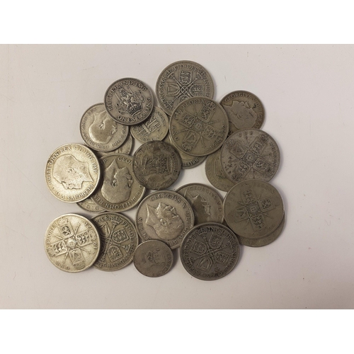 51 - A quantity of pre 1947 United Kingdom 0.500 silver coins.  Various grades. 180g approx.#50