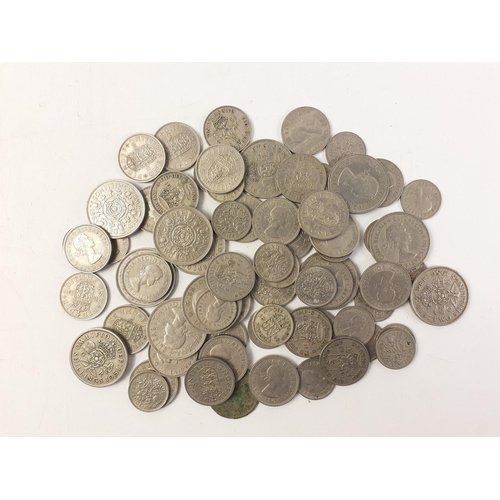 52 - A quantity of United Kingdom low value obsolete cupro nickel currency.  Mostly in good condition, an... 