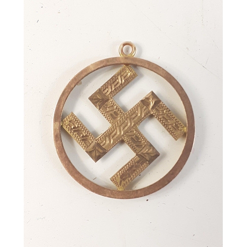 7 - A SWASTIKA pendant in 9ct gold with bright cut engraving. Indistinct makers stamp on rear with an R ... 