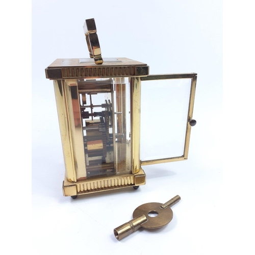 70 - Substantial solid ST JAMES LONDON brass carriage clock with key. Standing 12cm high approx this is a... 