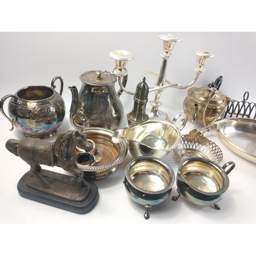 86 - A box of silver plate to include a WALKER & HALL vegetable dish (28cm), a toast rack, candelabra... 