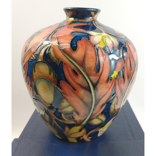 129 - A boxed MOORCROFT trial piece vase dated 4.6.2001, stands approx 18cm high, original price £325#135... 