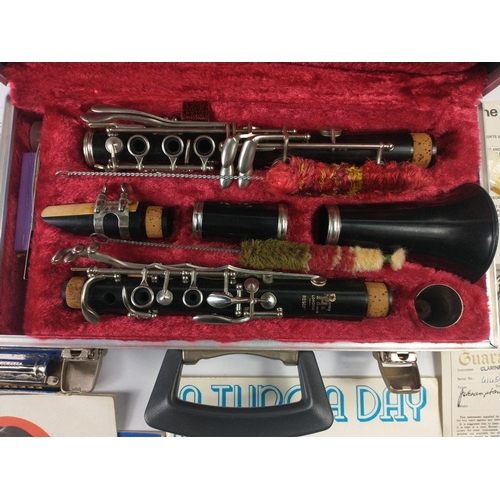 173 - A BOOSEY & HAWKES Regent clarinet (serial number 414503) in hard-sided case with guarantee, care... 