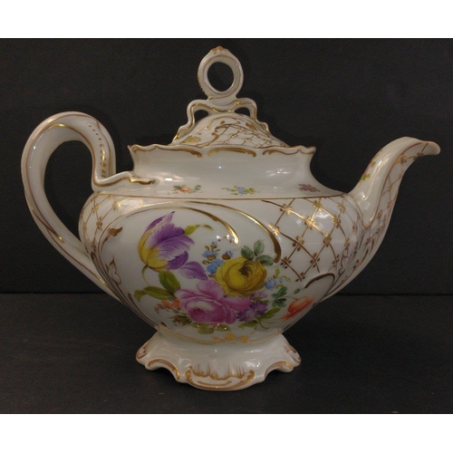 208 - A large DRESDEN porcelain teapot with a flower and gilt decoration standing approx 22cm high, no dam... 