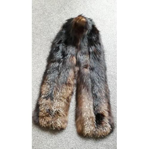 321 - A collection of various furs to include a fox stole, mink stole, Canadian fur muff, a lined light br... 