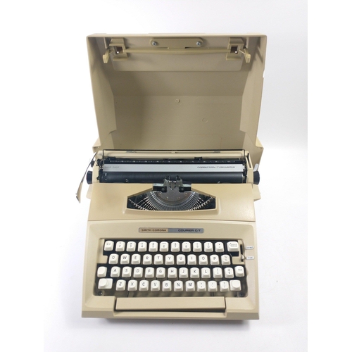 363 - A SMITH CORONA Courier C/T portable correction typewriter in a hard case#380