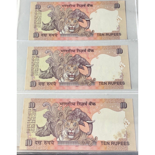 176 - A Numis banknote album containing a substantial collection of RESERVE BANK OF INDIA Ghandi notes in ... 