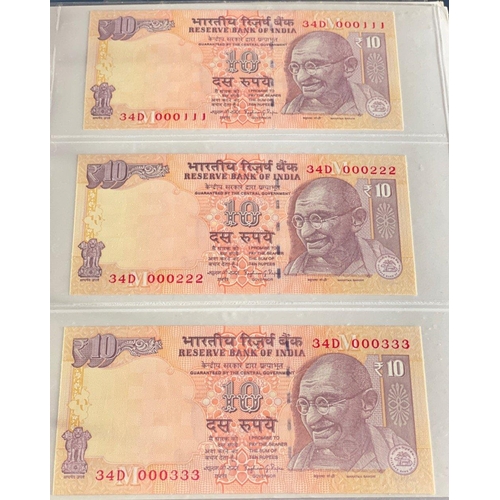 176 - A Numis banknote album containing a substantial collection of RESERVE BANK OF INDIA Ghandi notes in ... 