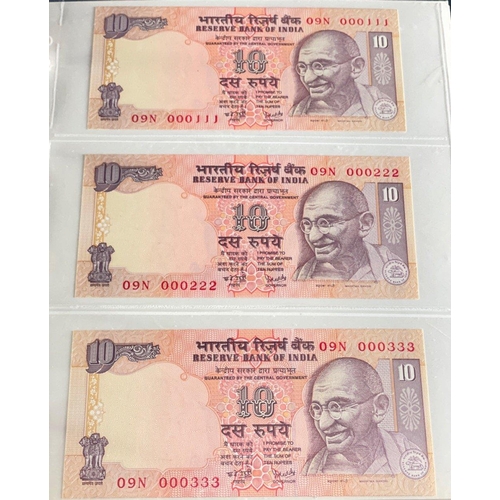 176 - A Numis banknote album containing a substantial collection of RESERVE BANK OF INDIA Ghandi notes in ... 