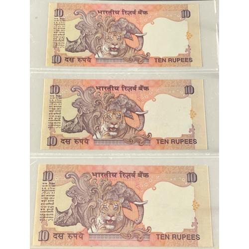 176 - A Numis banknote album containing a substantial collection of RESERVE BANK OF INDIA Ghandi notes in ... 