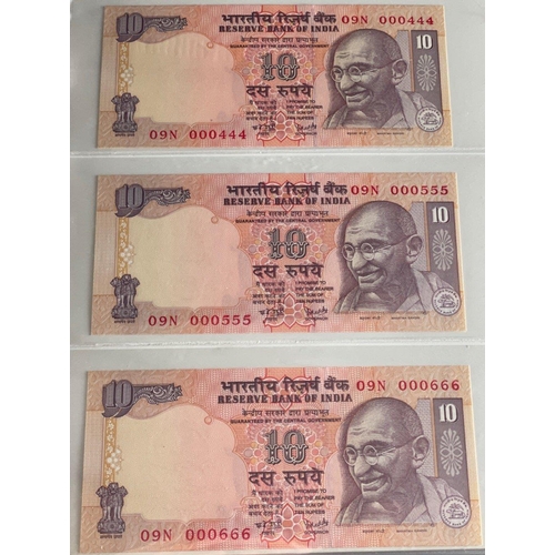 176 - A Numis banknote album containing a substantial collection of RESERVE BANK OF INDIA Ghandi notes in ... 