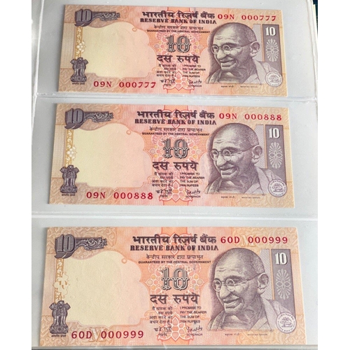 176 - A Numis banknote album containing a substantial collection of RESERVE BANK OF INDIA Ghandi notes in ... 