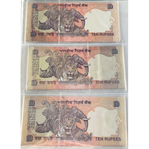 176 - A Numis banknote album containing a substantial collection of RESERVE BANK OF INDIA Ghandi notes in ... 