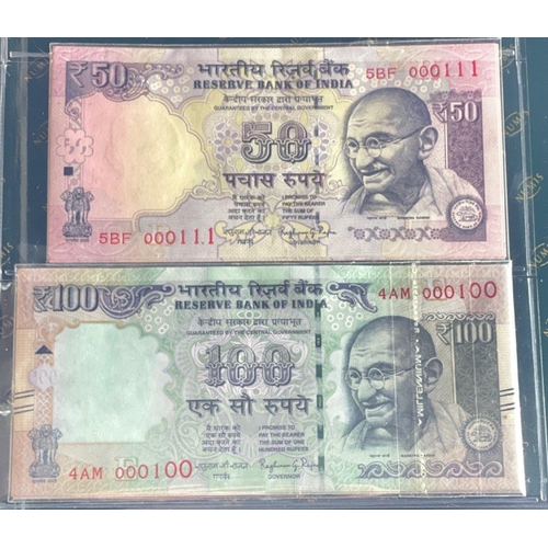 176 - A Numis banknote album containing a substantial collection of RESERVE BANK OF INDIA Ghandi notes in ... 