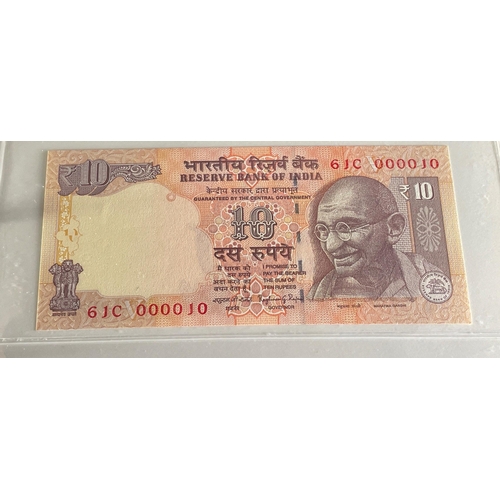 176 - A Numis banknote album containing a substantial collection of RESERVE BANK OF INDIA Ghandi notes in ... 