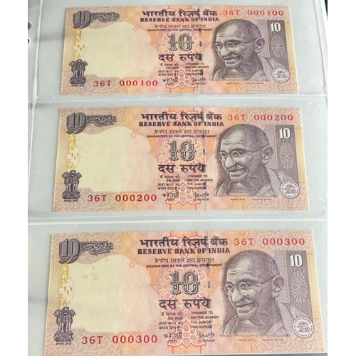 176 - A Numis banknote album containing a substantial collection of RESERVE BANK OF INDIA Ghandi notes in ... 