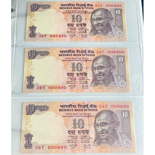 176 - A Numis banknote album containing a substantial collection of RESERVE BANK OF INDIA Ghandi notes in ... 