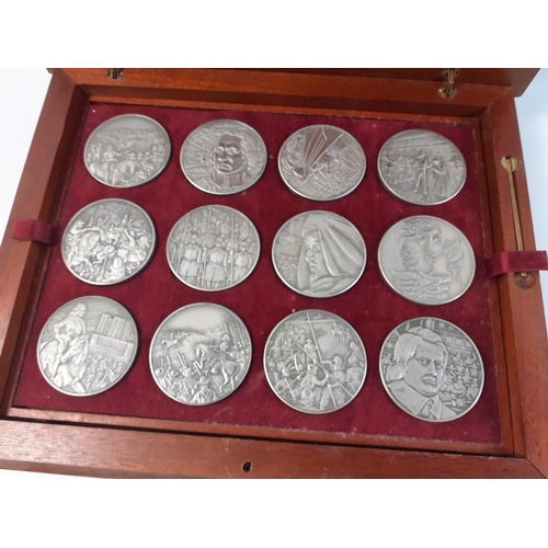 227 - A ROYAL MINT set of The English Civil War coins presented in a wooden display box.  A set of 12 coin... 