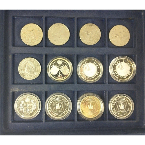 235 - A Westminster 2 tier coin display case with 16 five pound coins, and 5 £2 coins#235