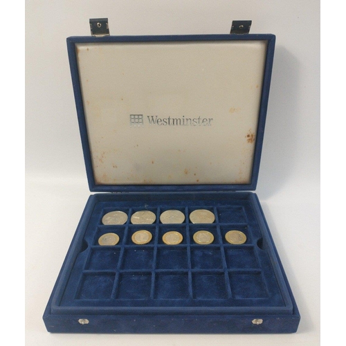 235 - A Westminster 2 tier coin display case with 16 five pound coins, and 5 £2 coins#235