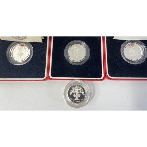 236 - Four ROYAL MINT United Kingdom silver proof Piedfort one pound coins, three in boxes, 2 with guarant... 