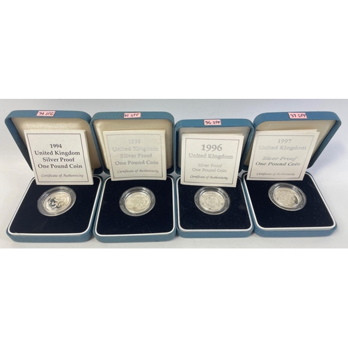 241 - Four boxed ROYAL MINT United Kingdom silver proof one pound coins from 1994, 95, 96, 97#241