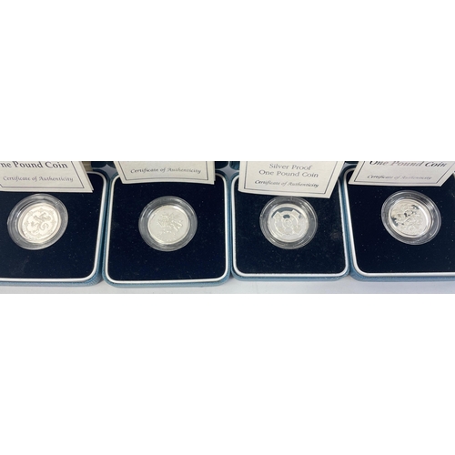 241 - Four boxed ROYAL MINT United Kingdom silver proof one pound coins from 1994, 95, 96, 97#241