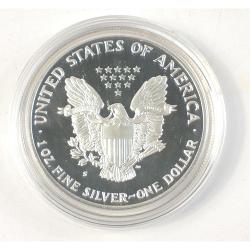 247 - Four boxed SILVER ONE OUNCE PROOF AMERICAN EAGLES in boxes with interior plush cases. 1986, 1989, 19... 