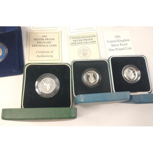 254 - Royal Mint Silver Proof Coin lot.  To include 1984 £1, 1990 Five Pence Piedfort x2, 1991 One Pound, ... 