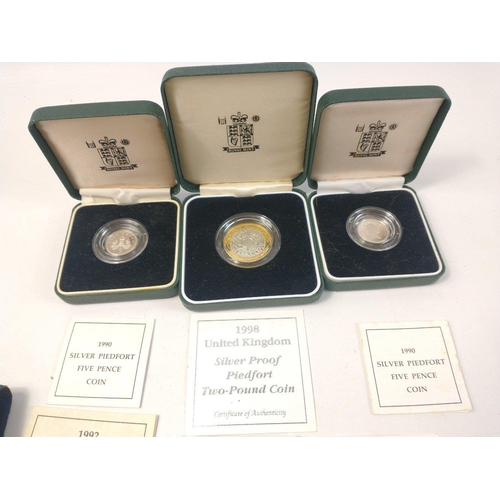 254 - Royal Mint Silver Proof Coin lot.  To include 1984 £1, 1990 Five Pence Piedfort x2, 1991 One Pound, ... 