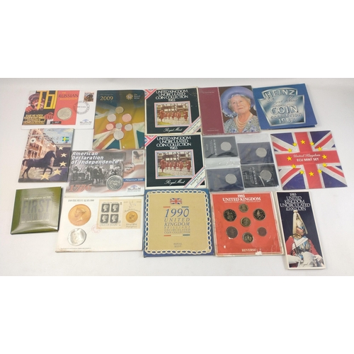 284 - A collection of coins and coin sets on cards to include 1971 Russian Revolution  1 Crown Cover, Isle... 