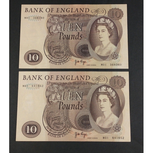 31 - Two large size brown PAGE Bank of England ten pound notes serial nos M01 368360 and M01 841852. Unci... 