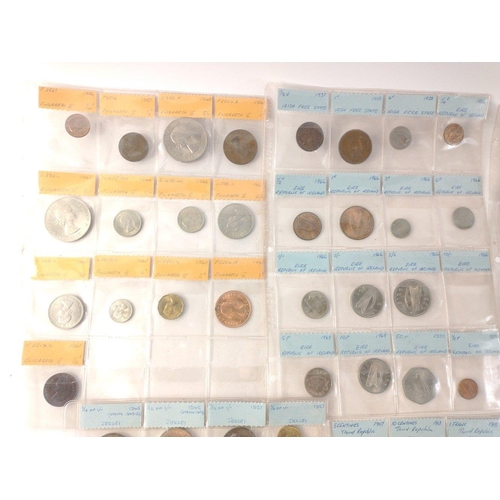 320 - Five sleeves of coins to include Third Republic of France 1913, 2 Franc token 1924, 50 Pfennigs 1950... 