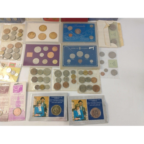 332 - A collection of coins to include various sets of interest including 1967 Singapore Specimen set, var... 