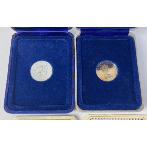 338 - Two ISLE OF MAN silver proof one pound coins in presentation cases both with certificates from the P... 