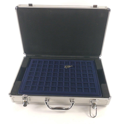 353 - An aluminium coin carrying case with 5 removable various sized trays, 40x20x10cm.  Comes complete wi... 