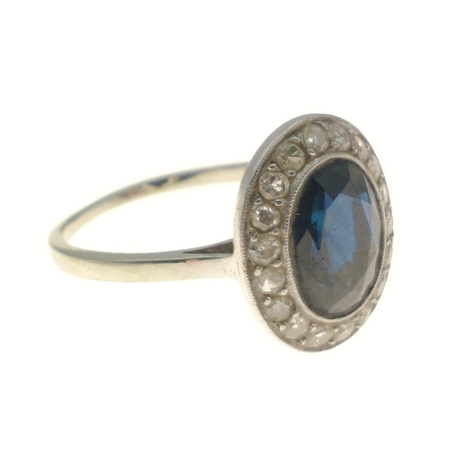 374 - A white metal oval shaped blue stone and diamond ring size M, gross weight 2.60g#8